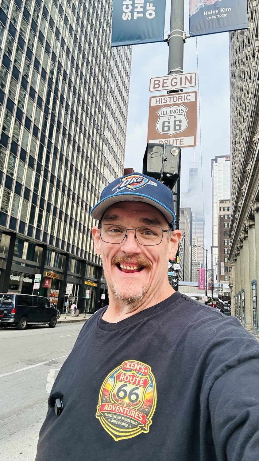 Ken at the Historic Route 66 Begin sign in Chicago